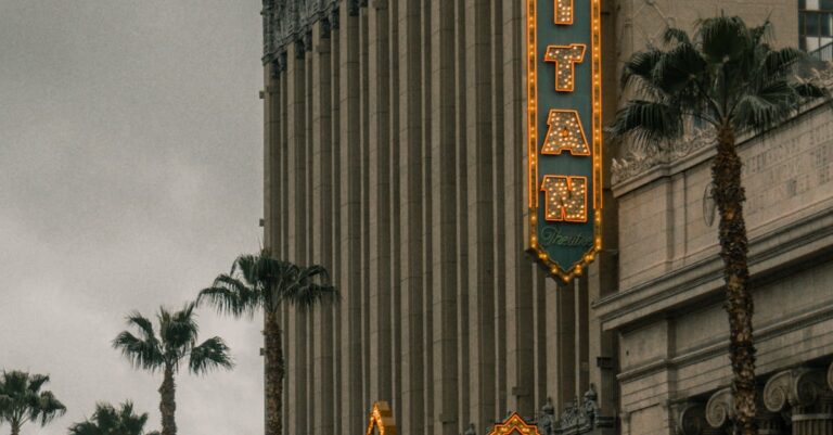 Iconic El Capitan Theatre in Hollywood, Los Angeles with vintage illuminated sign.