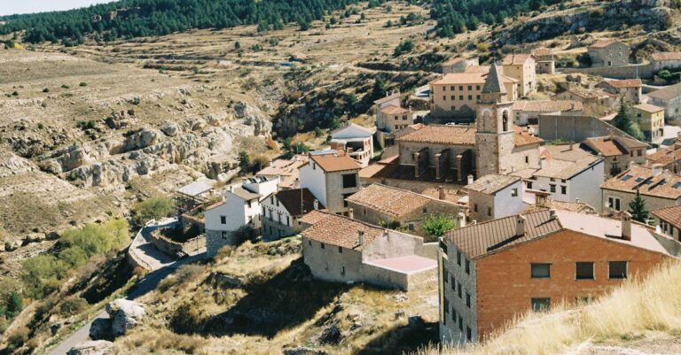 Charming aerial view of a rustic Spanish village during autumn.